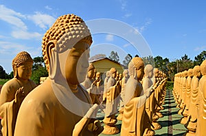 Statues in the buddhist temple of Iguassu Falls, Brazil. photo