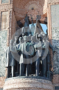 Statues of bunch of people on Republic Monument Taksim Square photo