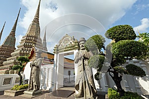 Statues and chedis at the Wat Pho temple in Bangkok