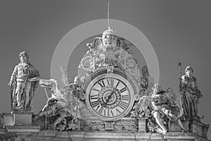 Statues and clock on the roof of the Vatican in Rome. Saint Peter