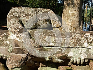 Statues of Demons and Gods near East Gate, also known as the Gate of the Dead, in Angkor What, Cambodia