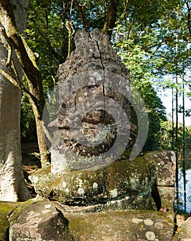 Statues of Demons and Gods near East Gate, also known as the Gate of the Dead, in Angkor What, Cambodia