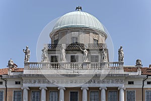 statues and dome on Carciotti building, Trieste, Friuli, Italy photo