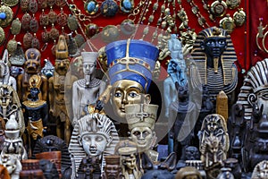 Statues of Egyptian Pharaoh in market.