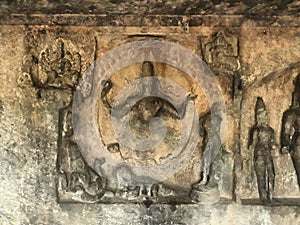Statues engraved in a temple in tamil Nadu India. The temle nam is rock cut cave temple photo