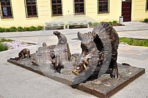 Statues of feral pigs