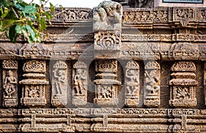 Statues of figures dancing, playing musical instruments and marching elephants at Hindu Sun Temple, Konark, Orissa, India, UNESCO