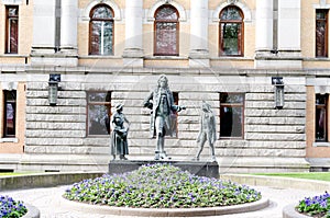 Statues in front of National Theater in Oslo Norway photo