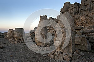 Statues of goddess Tyche of Commagene far left, Zeus, Antichos and Hercules on the eastern platform at Mt Nemrut in Turkey.