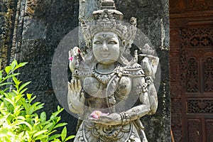 Statues of guardian gods temple in Bali. Brahma Vihara Arama with statues gods. balinese temple, old hindu architecture, Bali