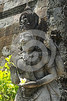 Statues of guardian gods temple in Bali. Brahma Vihara Arama with statues gods. balinese temple, old hindu architecture, Bali