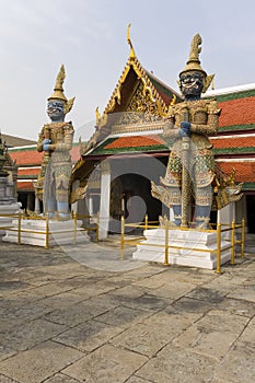 Statues guarding temple door