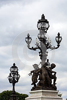 Statues and lanterns on Pont Alexander III, Paris, France