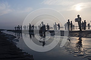 Statues in Lapindo mud.