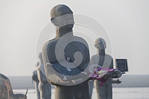 Statues in Lapindo mud.