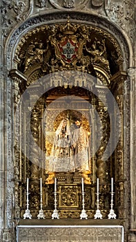 Statues of the Madonna, the infant Jesus and Joseph in a side altar in the Church of Santa Maria, Lisbon. photo