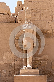 The statues of Pharaoh Ramses III guarding the precinct of the temple of Karnak, Luxor, Egypt