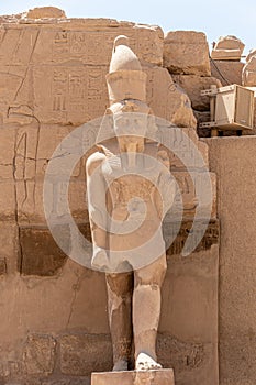 The statues of Pharaoh Ramses III guarding the precinct of the temple of Karnak, Luxor, Egypt