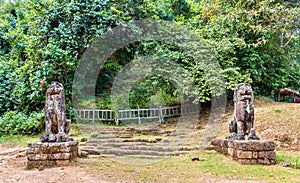 Statues at Phnom Bakheng in Angkor Wat - Cambodia