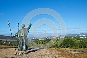 Statues of Pilgrims pointing the cathedral on Monte do Gozo in Santiago de Compostela, Spain