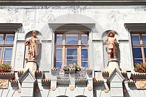Statues on renaissance house