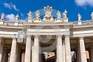 Statues of saints and apostles on colonnade of St. Peter`s basilica, Vatican