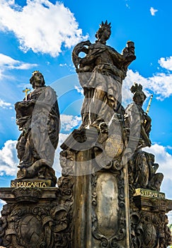 Statues of Saints Barbara, Margaret and Elizabeth on Charles Bridge in Prague