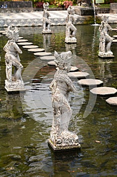 Statues of Tirta Gangga water palace. Karangasem Regency. Bali. Indonesia