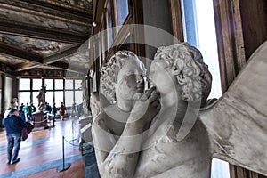 Statues and tourists in the Uffizi Gallery, Florence, Italy