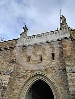 Statues of two warriors with  Speer detail of entrance to the Hohenzollern castle, a photo