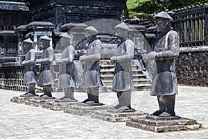 Statues of warriors in Imperial Khai Dinh Tomb in Hue, Vietnam