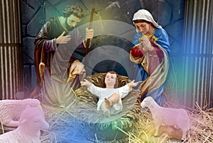 Statuettes of baby Jesus,The birthday of Jesus is a statuette of Maria with Joseph and newborn Jesus on the hay, A Christmas nativ