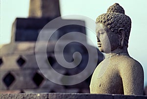 Statute of Buddha in Borobodur temple district, Java, Indonesien photo