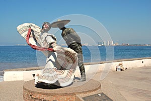 Statute of dancing couple on the MalecÃÂ³n photo