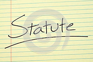 Statute On A Yellow Legal Pad