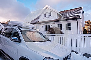 White Volvo Car Parked Ourside A Private House In Downtown Stavanger