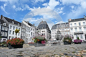 Stavelot town square with fountain and flower boxes
