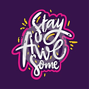 Stay awesome phrase. Hand drawn vector lettering phrase. Isolated on violet background.