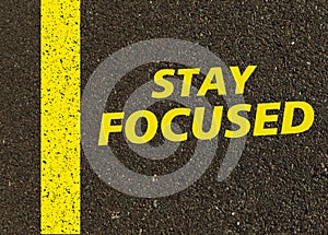 Stay focused written on the road.