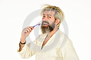 Stay healthy. Personal hygiene. Bearded hipster cleaning teeth. Freshness and cleanliness. Keep teeth healthy. Brush