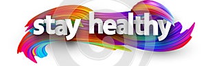 Stay healthy sign over brush strokes background