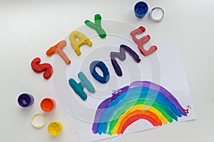 Stay home Colorful letters and rainbow picture photo