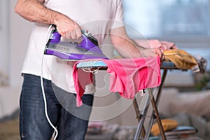 Stay-at-home dad ironing