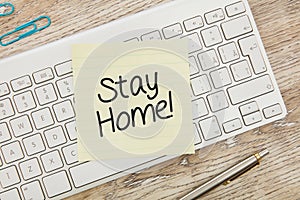 Stay home message on post-it