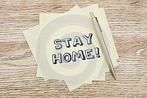 Stay home message on post-it