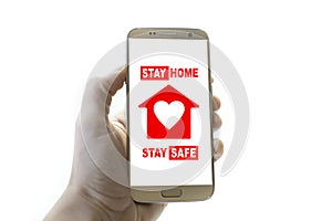 Stay Home/Stay Safe alert message on mobile phone.stay ata home advice for not spreading coronavirus