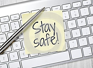 Stay safe message on post-it