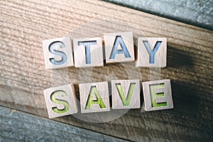 Stay Save Written On Wooden Blocks On A Board photo