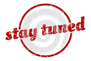 stay tuned sign. stay tuned round vintage stamp.