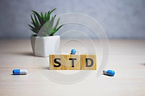STD Sexually transmitted infections text on wooden cubes. medical concept. photo